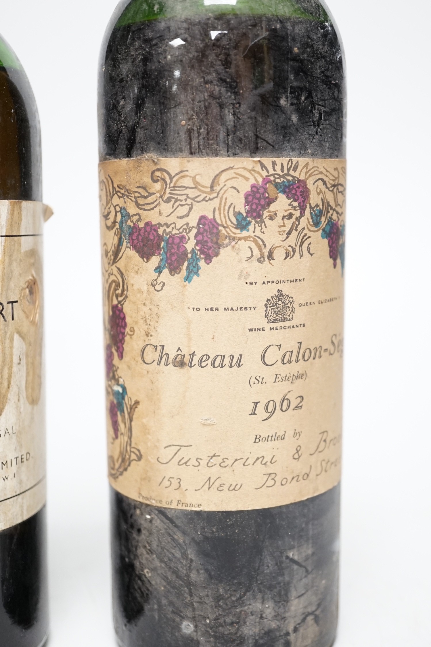 A bottle of Army and Navy stores 1960 vintage port and a bottle of Chateau Calon-Segur 1962